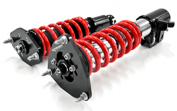 Coilover camber plates